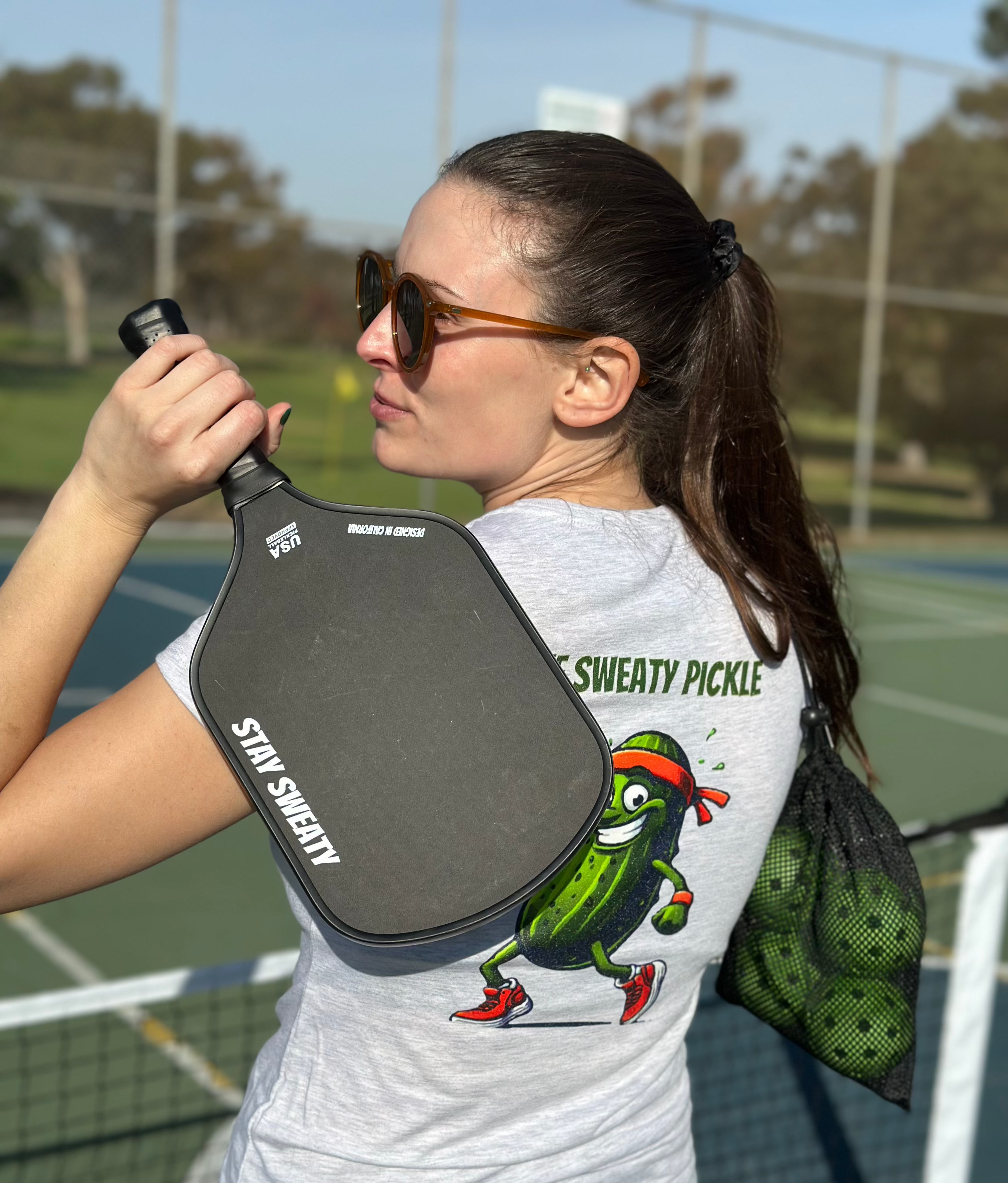 Women with Carbon Fiber Pickleball Paddle - The Sweaty Pickle